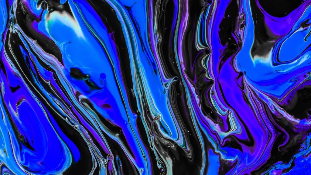 close-up-shot-of-thick-paint-of-various-bright-col-2023-11-27-05-33-46-utc